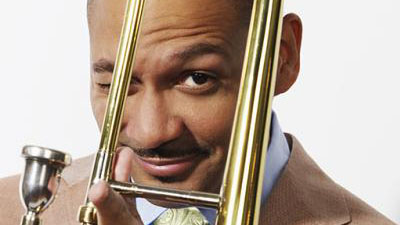 Photo of Delfeayo Marsalis posing with his trombone; links to news story