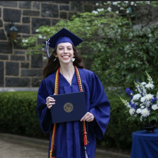 Photo of Lauren Millhorn; links to graduate student profile
