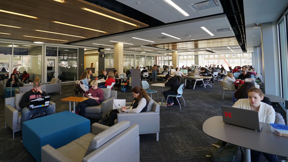 Students studying in Adele Coryell Hall Learning Commons; links to news story