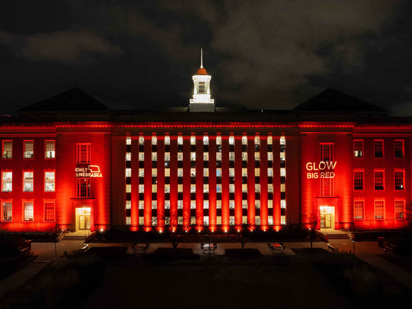 Library exterior lit up red