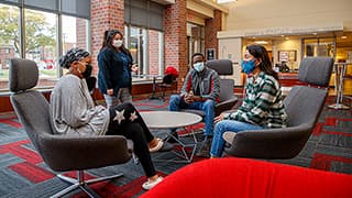 Honors students meet in the lobby of Knoll Residential Center.