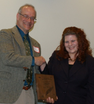 Susan Martens receiving award from Robert Brooke