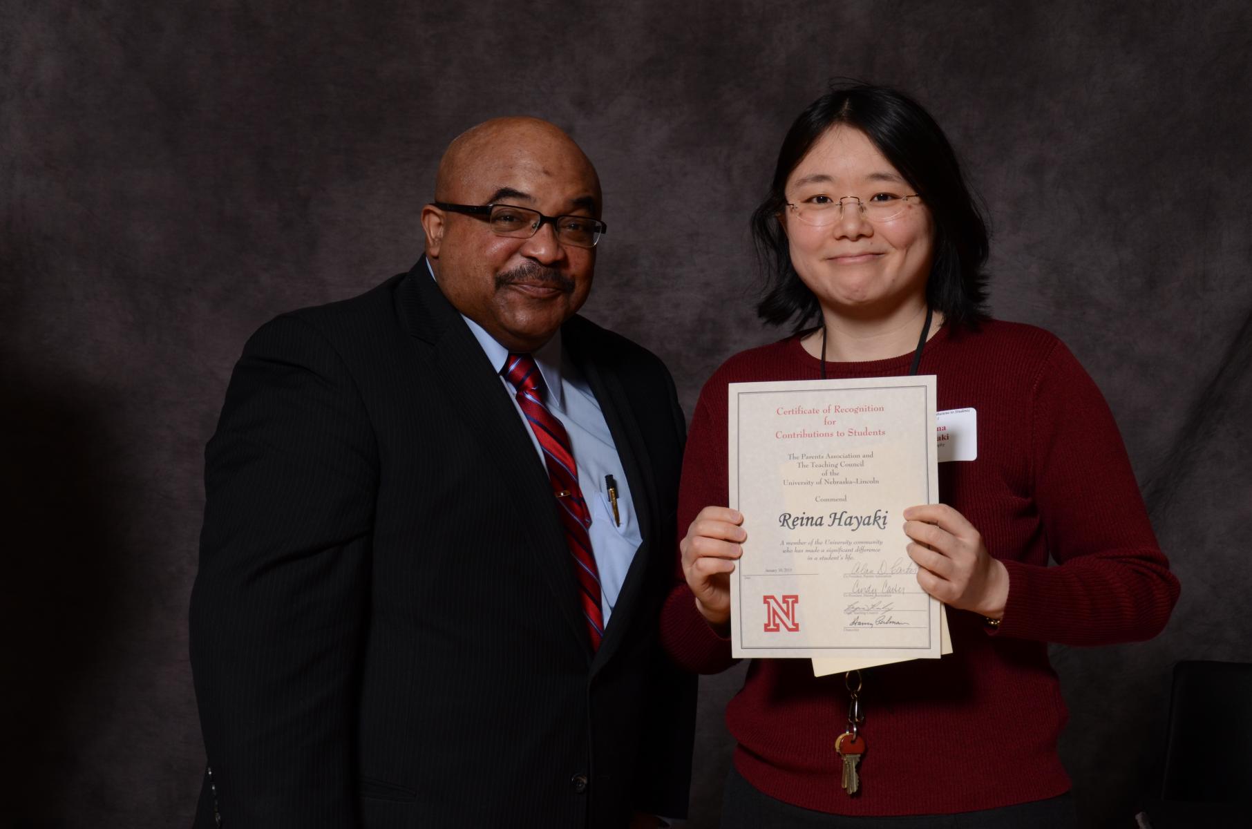Reina Hayaki receiving her award at the 2015 UNL Parents Recognition Ceremony
