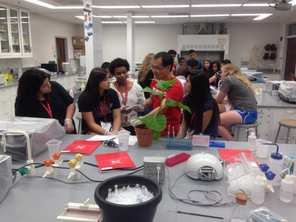 July, 2014. Graduate student Fan Yang working with high school students at a workshop on plant science held at Nebraska.