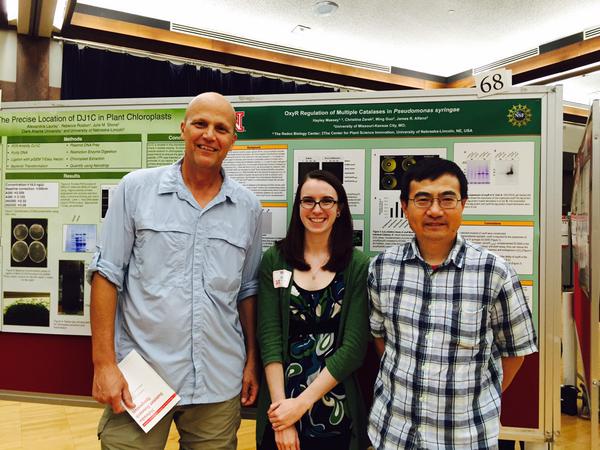 August, 2015. Univ MIssouri-KC undergrad and UNL summer researcher Hayley Massey at UNL Res Symposium. Alfano, Hayley, & Ming Guo.