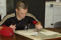Cadet Baker Completes a Map Reading Test