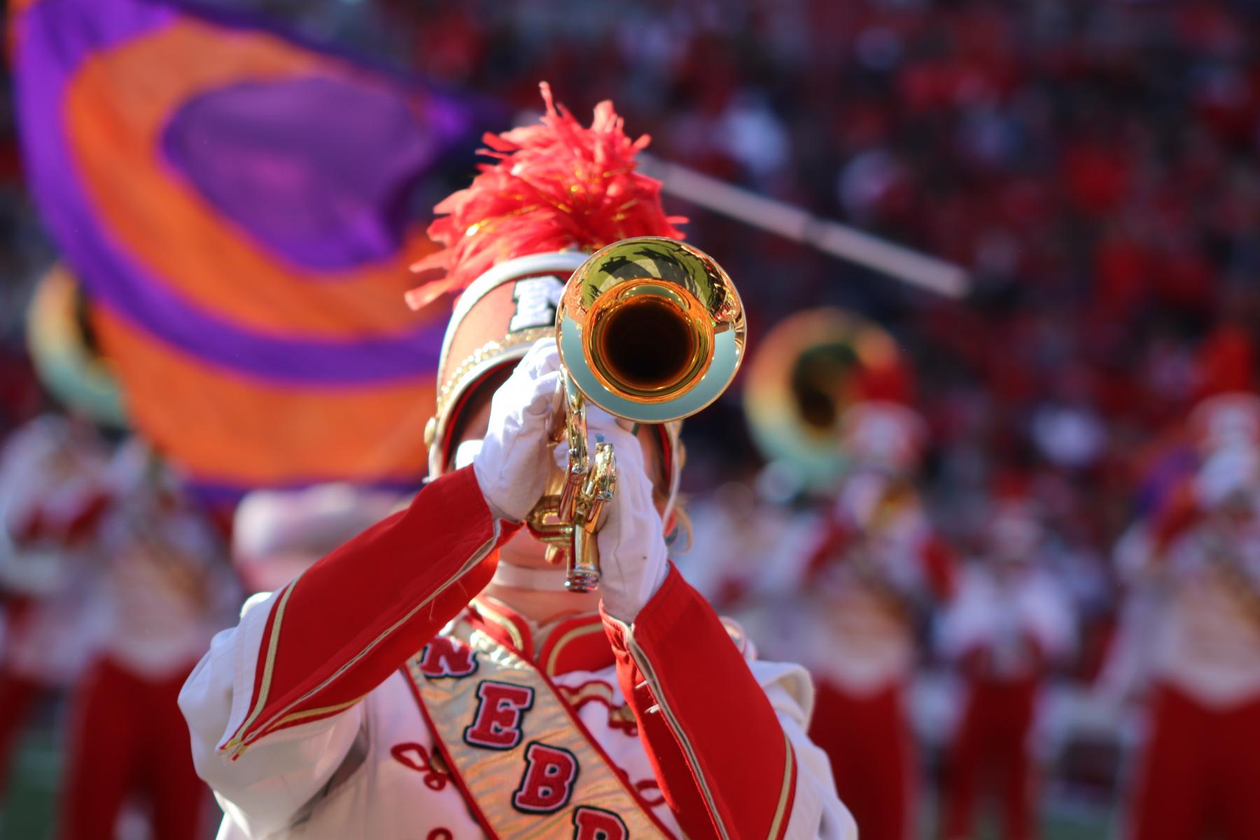 Photo of Cornhusker Marching Band trumpet at Memorial Stadium.