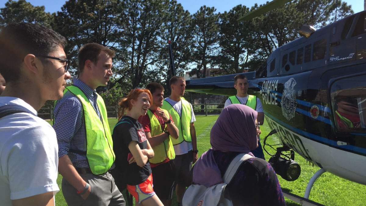 Students looking at police helicopter