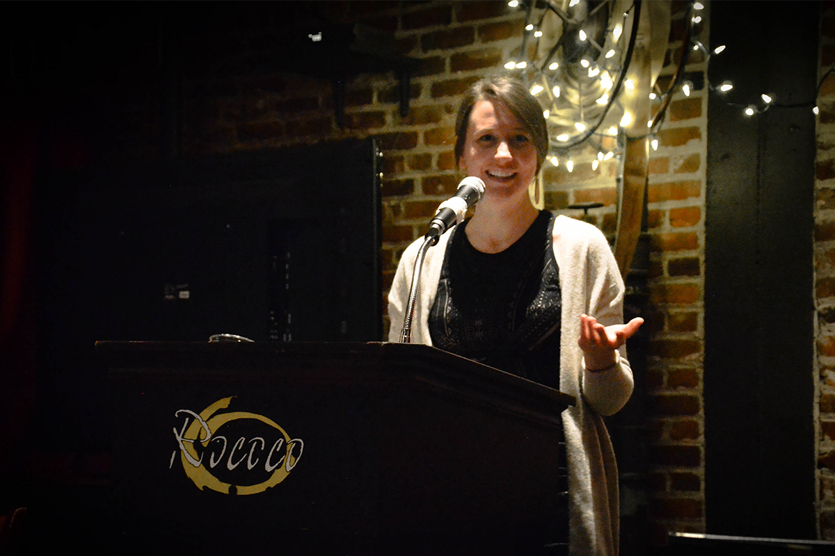 Katie Schmid Henson reads from her poetry at a No Name Reading series event - photo by Erin Chambers