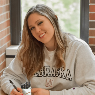 Photo of Hailey Fischer; links to graduate student profile
