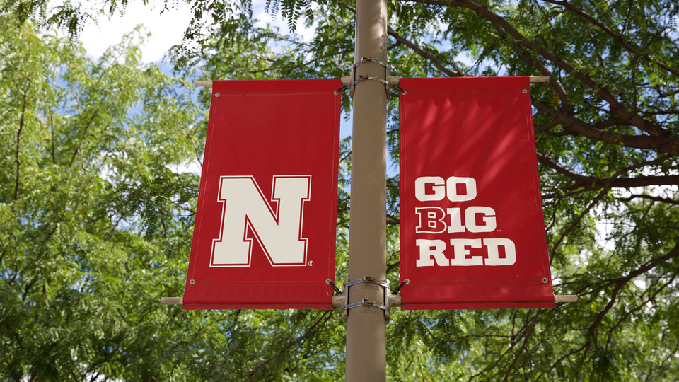 Go Big Red banner on campus; links to news story