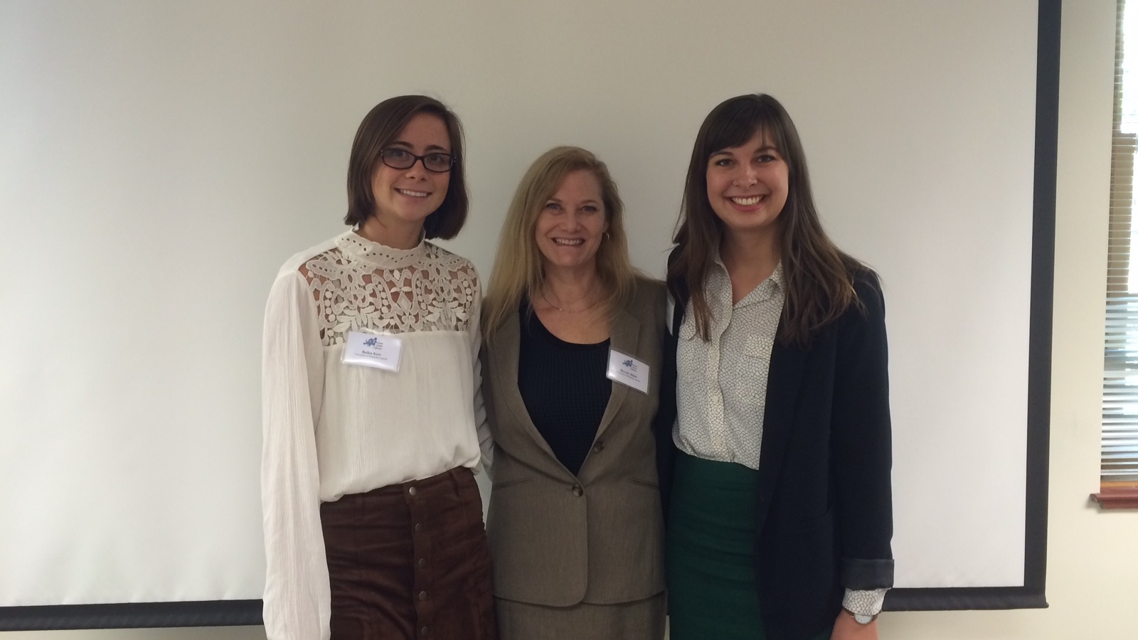 Bailea Kerr, Dr. Beverley Rilett, and Roz Thalken at the European Studies Conference; links to news story