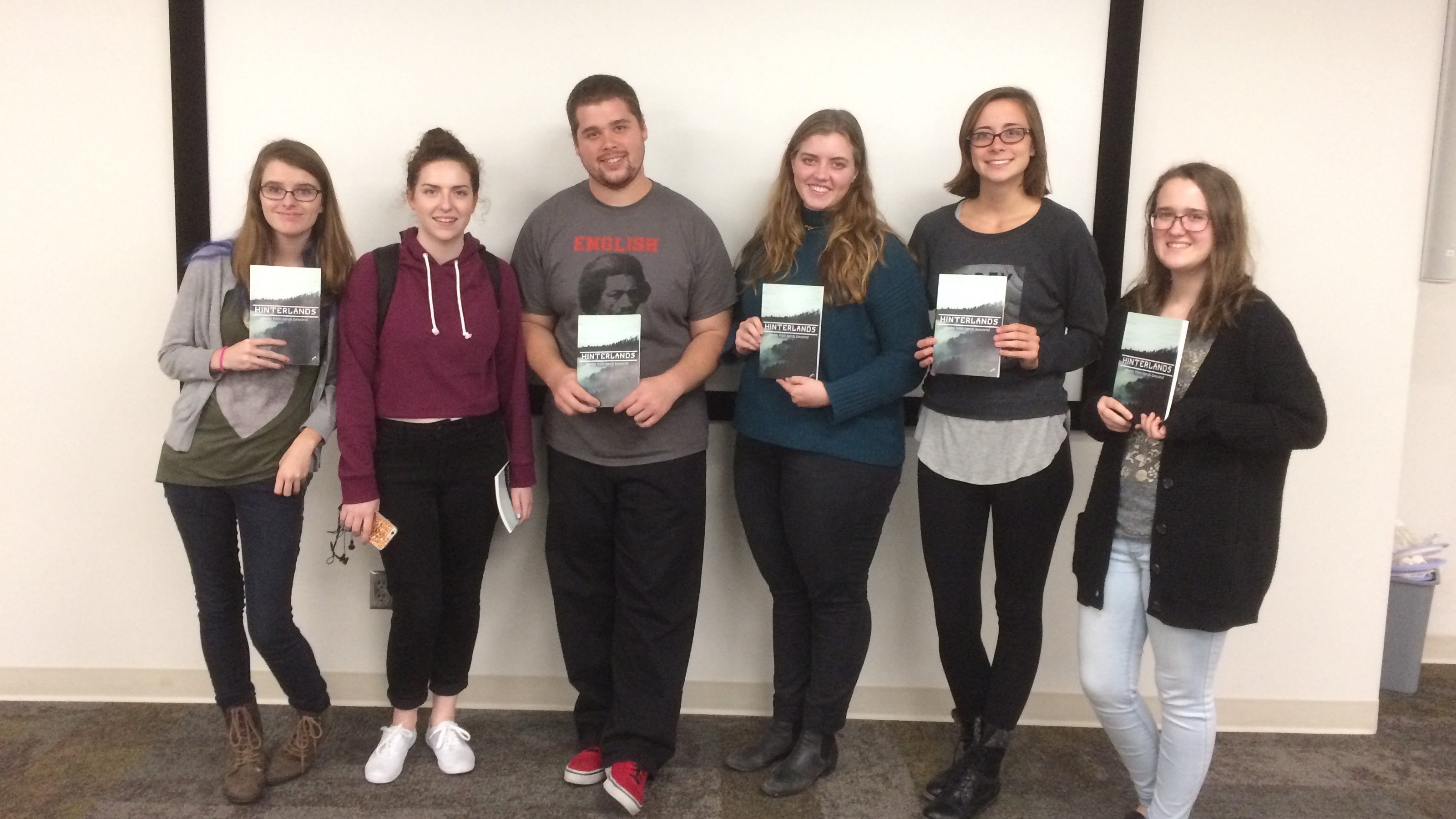Students from Beverley Rilett's Editing and Publishing class pose with their first publication.; links to news story