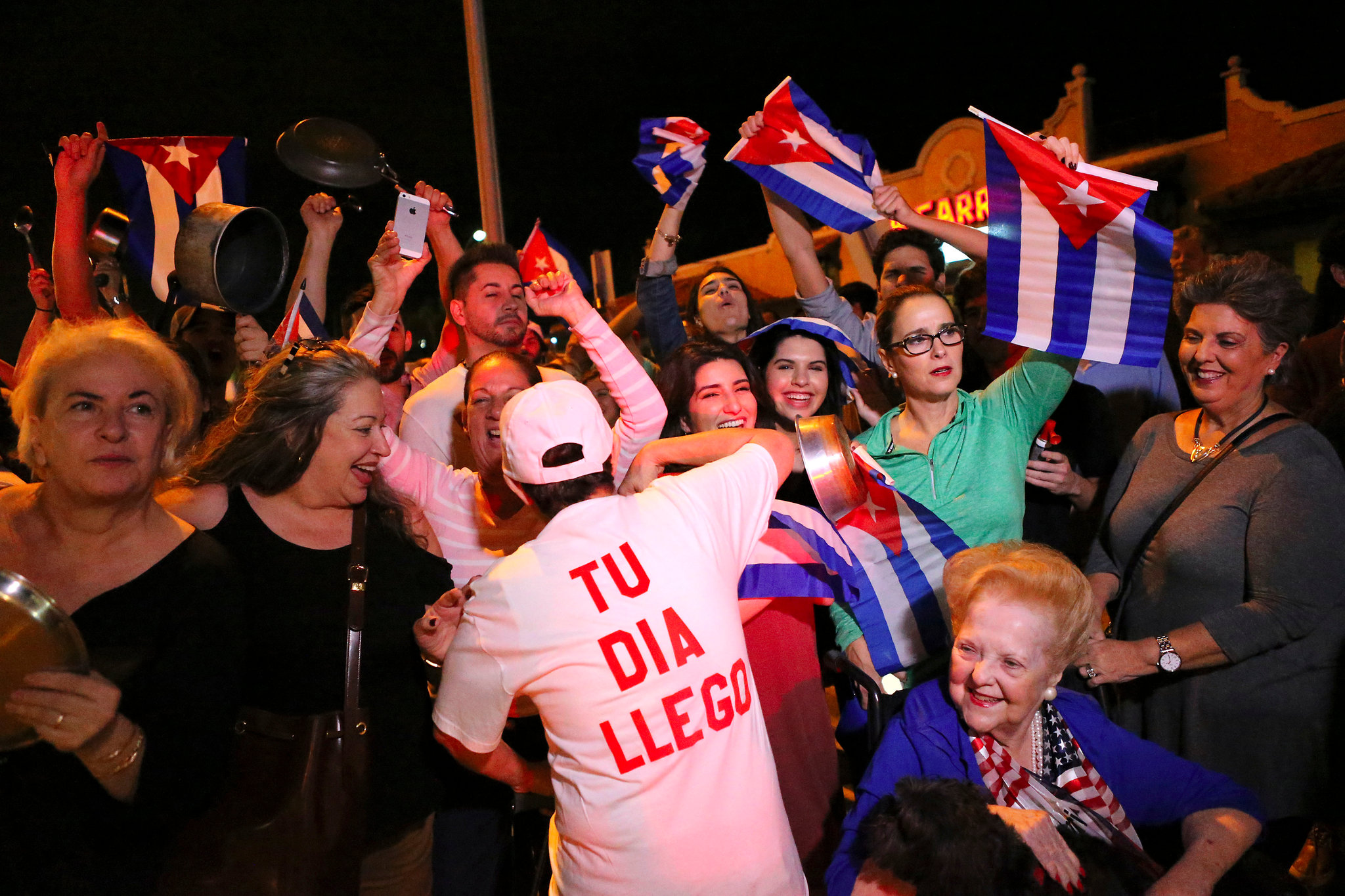 The Cuban community celebrated early Saturday in Miami, after the announcement that Fidel Castro had died.; links to news story