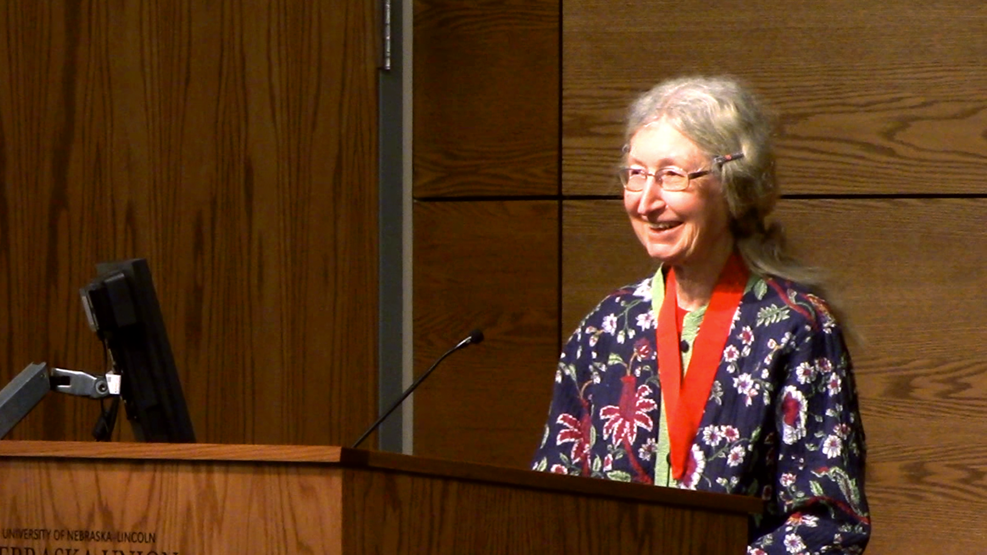 Fran Kaye speaks at the Faculty Senate meeting on April 26; links to news story