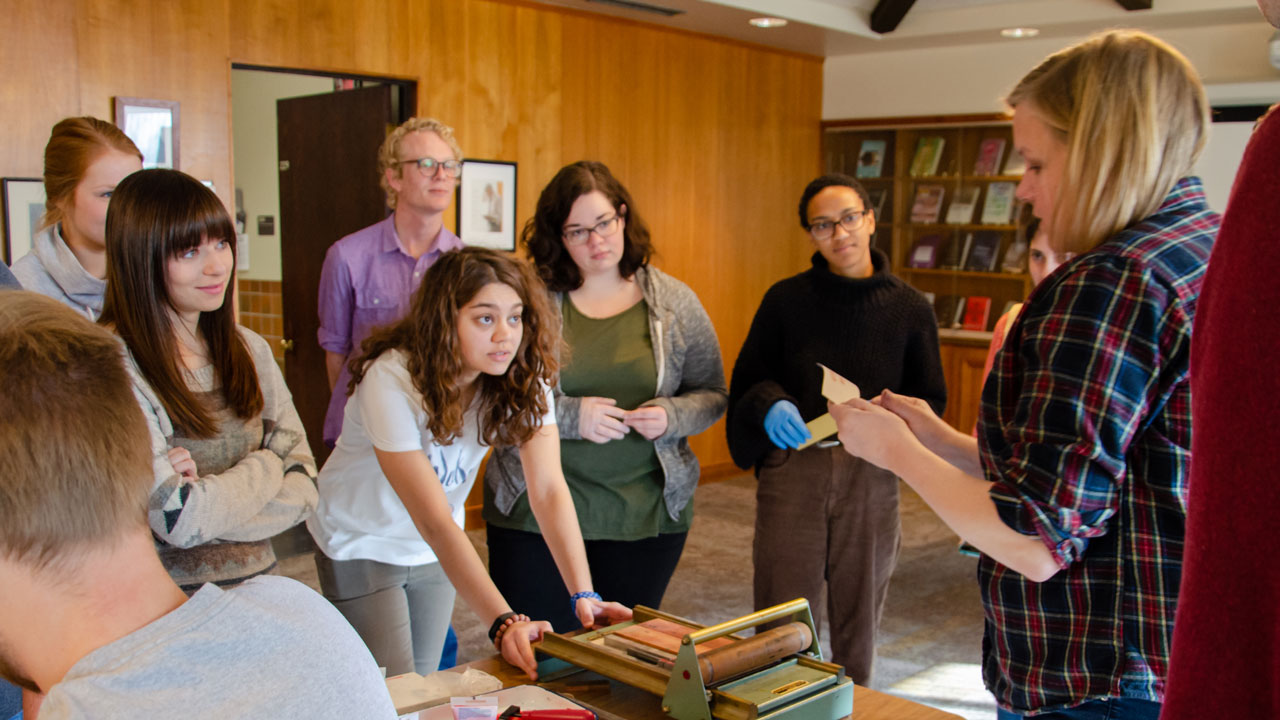 Amanda Gailey talks with students in her English 379 class during a letterpress demonstration