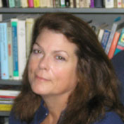 Photo of Laura White; links to faculty profile