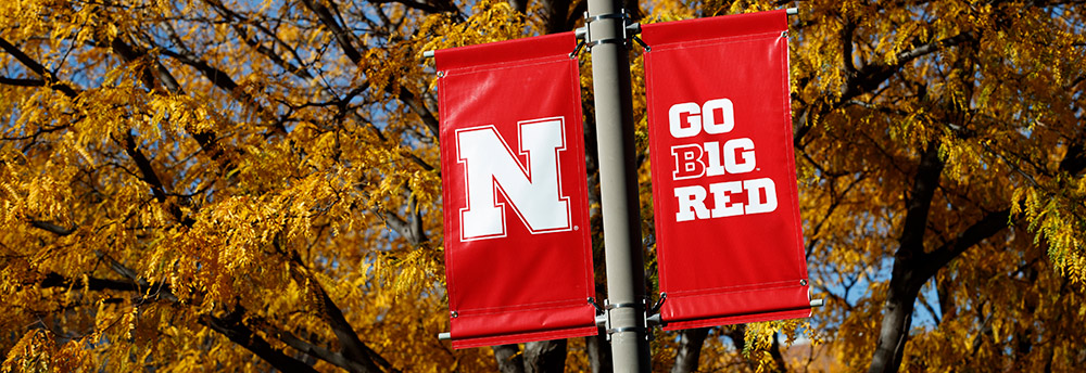 Red UNL banners on campus