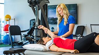 A Nebraska student receives physical therapy while at the Health Center.