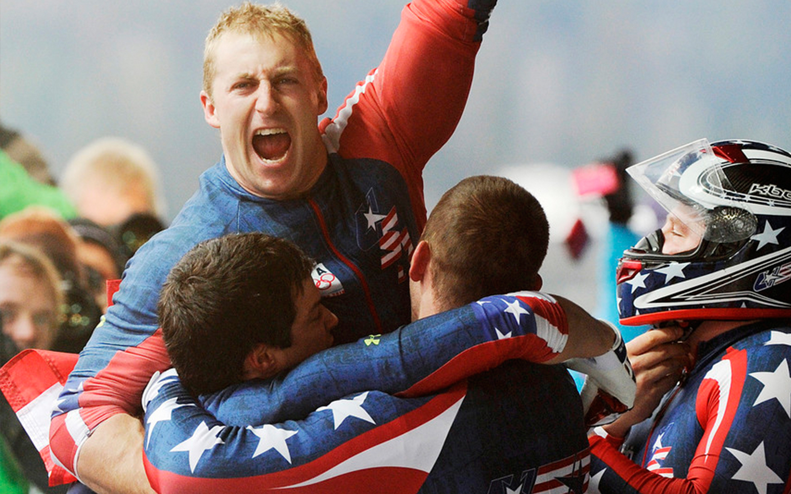 Tomasevicz celebrates with USA-1 teammates after their gold medal finish in the four-man bobsled final at the 2010 Winter Olympics in Vancouver, Canada