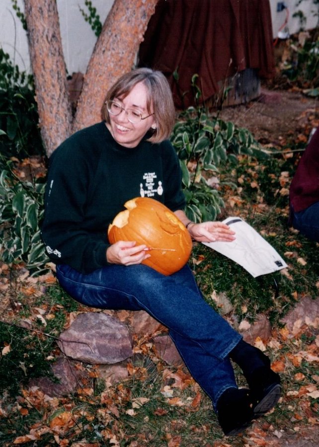 Carol MacDaniels at Kate and Robert Brooke's pumpkin carving party in 1996