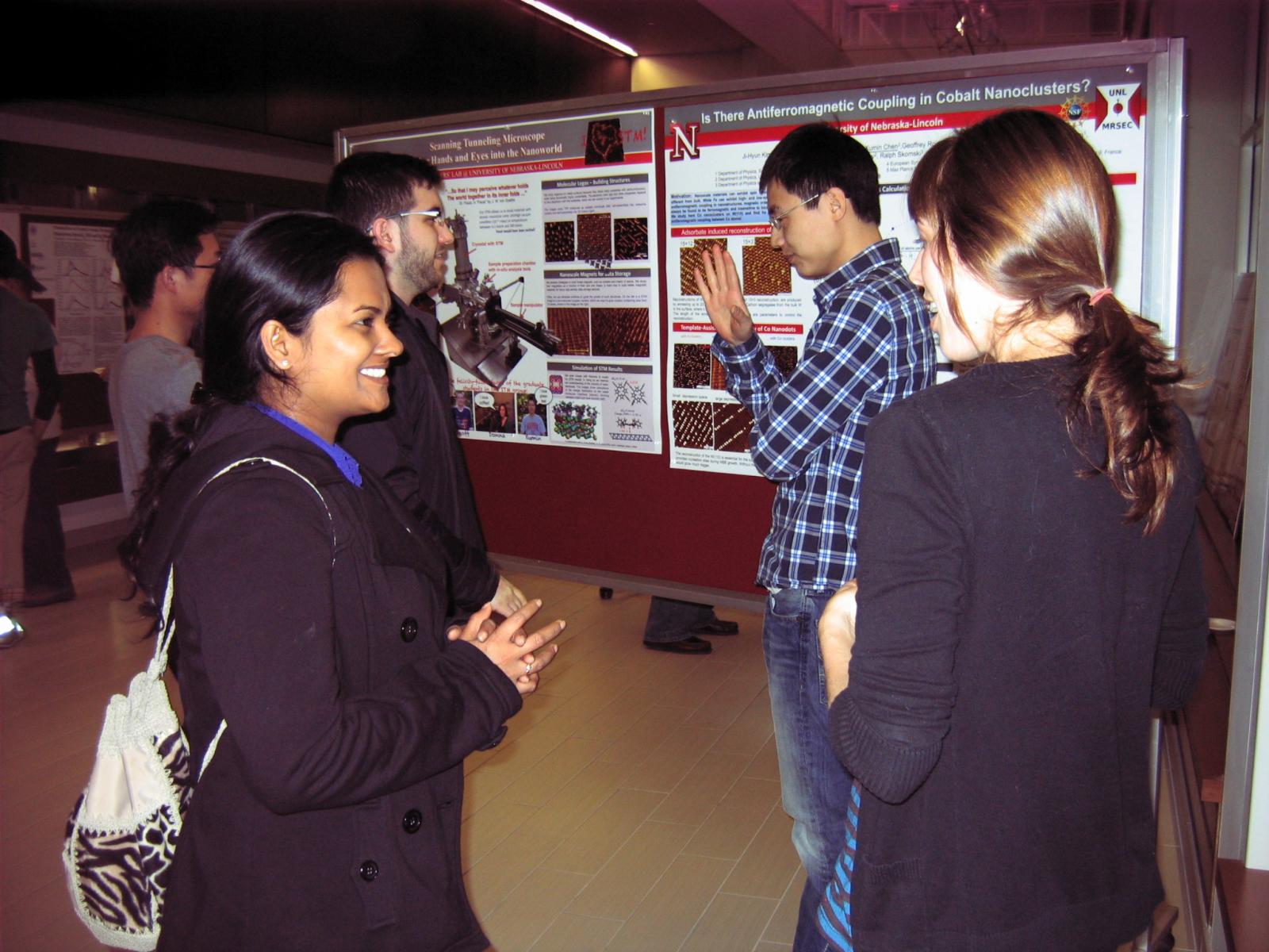 Students attending poster presentations