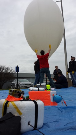 Students setting up a weather balloon