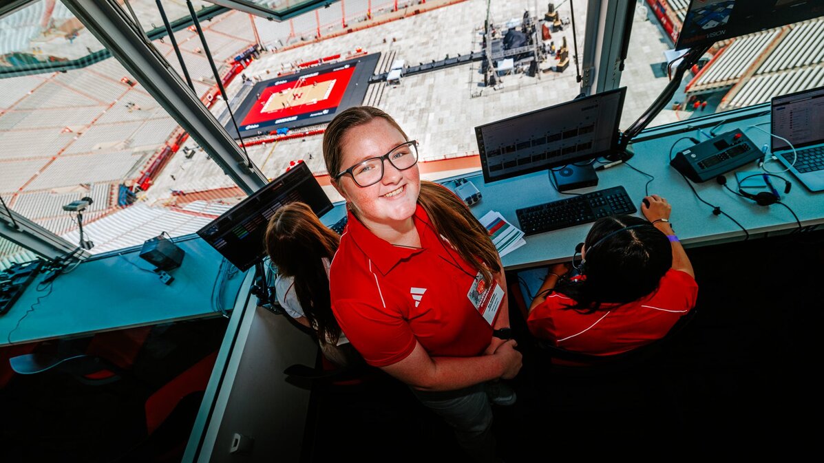 Melanie smiles for a photo in the booth on Volleyball Day in Nebraska