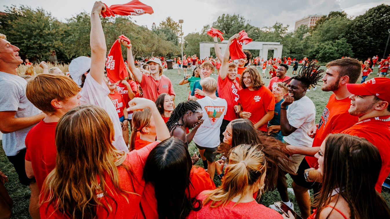 A group of students dance at the Chancellor’s BBQ to welcome the class of 2026 in the greenspace by the Nebraska Union