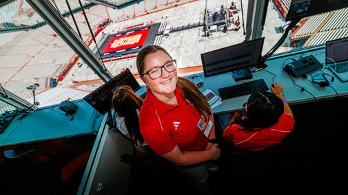 Melanie smiles for a photo in the booth on Volleyball Day in Nebraska