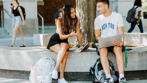 Dinushi Jayasekara, left, and Eldin Salja, a freshman from Lincoln, talk outside the Union on the first day of classes.