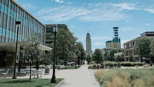 Andersen Hall appears on the left with the Capitol in the distance on a sunny day in Lincoln, Nebraska