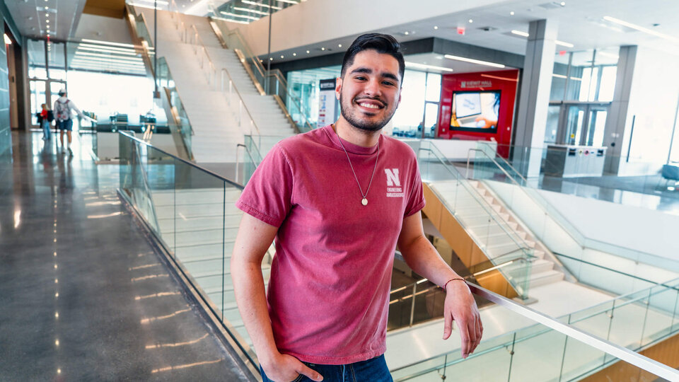 Student standing in lobby of Keiwit Hall