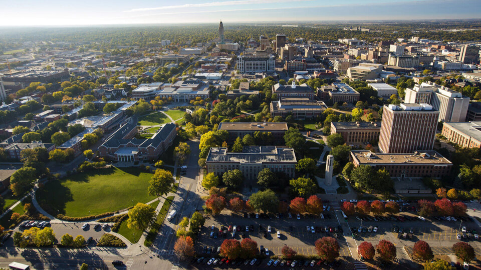 Aerial image of University of Nebraska city campus with capitol building in background