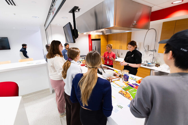 Sarah Keegan (left), Nebraska Medicine dietician, and Ellyn McCarter, dietician and nutrition manager with Dining Services, prepared two healthy recipes based on cost-effective pantry staples to share with students in a cooking demonstration at the University Health Center on March 5, and with faculty and staff on March 6. Participants learned to prepare both McCarter's grain bowl recipe and a chicken and vegetable ramen recipe developed by Sarah Keegan, Nebraska Medicine dietician, and did a taste test of 