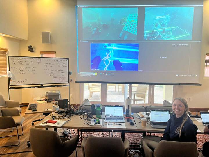 Allison Porter Carpenter collecting real-time dive data in the SEATEST 7 Mission Control Center as Data Collection lead