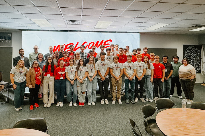 Mallory poses with a group of students and Center for Entrepreneurship staff members.