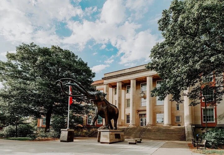 A statue of Archie the Mammoth stands tall outside Morrill Hall