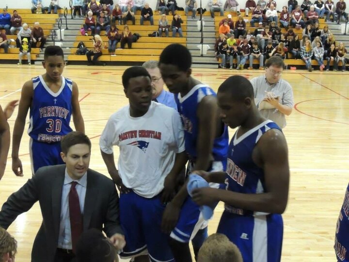 Garth coaches his team courtside