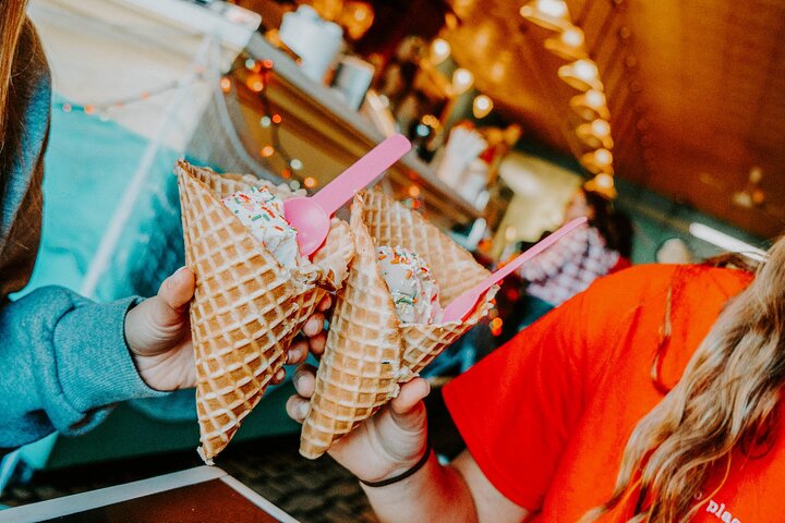 Student “cheers” with ice cream cones at Ivanna Cone in the Haymarket