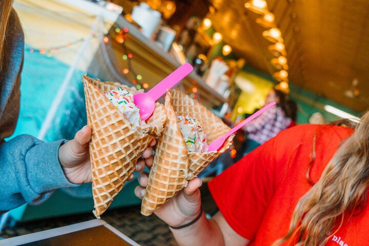 Students “cheers” with their cones of ice cream