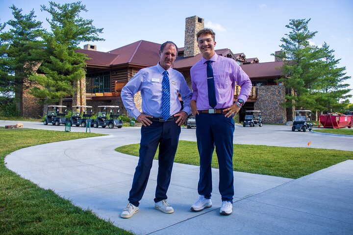 Koby and his mentor Mike Schuchart working a golf outing at Wilderness Ridge Country Club.