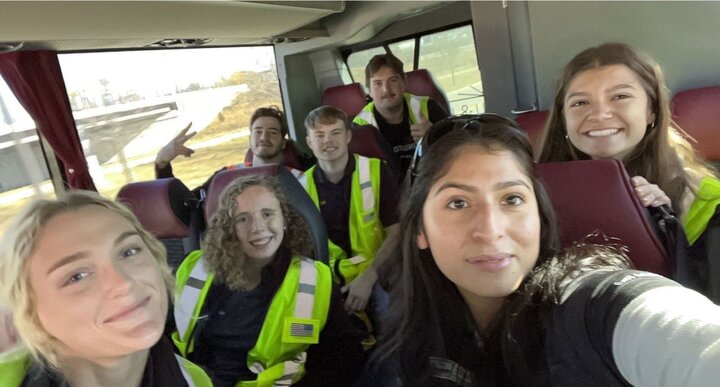 Sierra (far right) and fellow Scholars on a bus during an excursion for the group