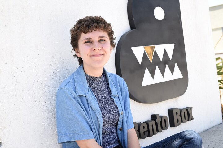 Michaela smiles for a photo outside Bento Box