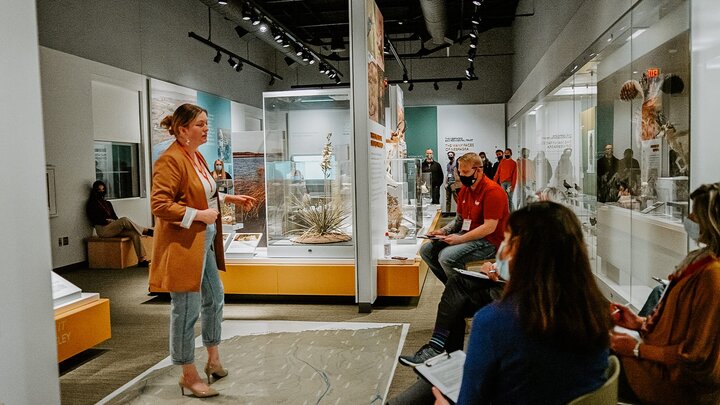Maria Heyen gives a pitch during the 3–2–1 Quick Pitch Competition in Morrill Hall
